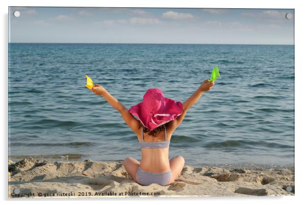 happy little girl with hat looking at the sea Acrylic by goce risteski