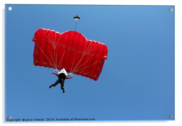 parachutist with red parachute on blue sky Acrylic by goce risteski