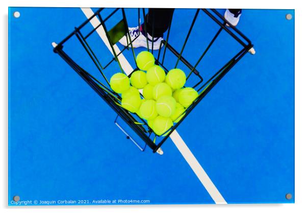 Basket full of yellow tennis balls for training tennis players o Acrylic by Joaquin Corbalan