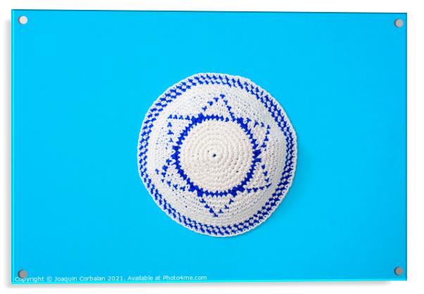 Kippah is a circular hat, with the flag of Israel, isolated on a Acrylic by Joaquin Corbalan