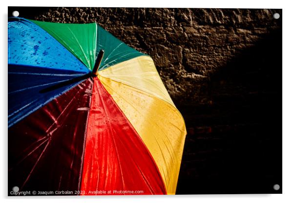 Open umbrella against the intense sun with bright colors and dar Acrylic by Joaquin Corbalan