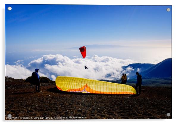 Skydiving experts and monitors prepare the sail of a paraglider  Acrylic by Joaquin Corbalan