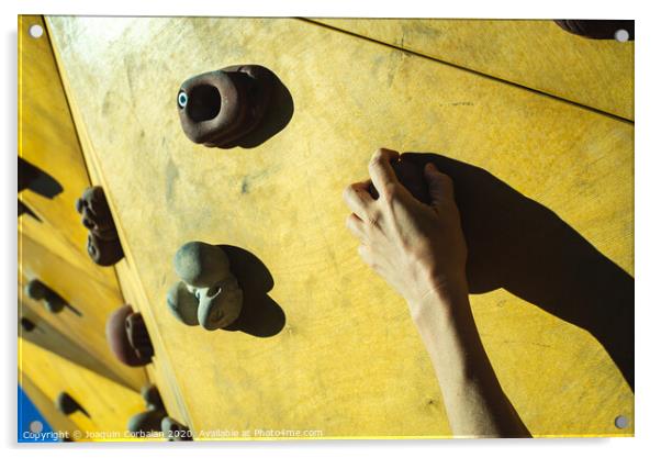 Hand of a person trying to climb the fixie of a climbing wall Acrylic by Joaquin Corbalan