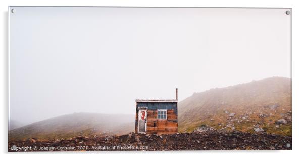 Small wooden hut on top of a mountain surrounded by fog in winter to seek solitude. Acrylic by Joaquin Corbalan