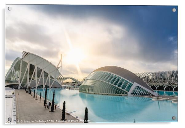 Panoramic cinema in the city of sciences of Valencia, Spain, visited by tourists next to the museum of sciences of the city in the background, at dawn with clouds and sun. Acrylic by Joaquin Corbalan