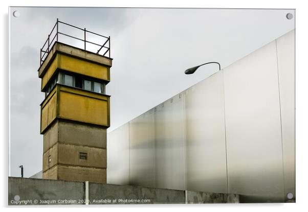 Berlin, Germany - June 6, 2019: Watchtower next to a wall on a border to control illegal immigrants. Acrylic by Joaquin Corbalan