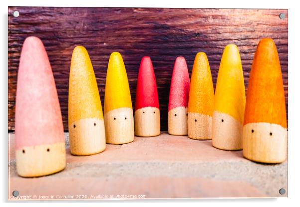 Set of colored wooden conical fish toys for unstructured children's games. Acrylic by Joaquin Corbalan
