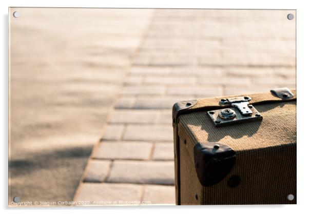 Close-up detail of an old vintage suitcase with blur background with copy space. Acrylic by Joaquin Corbalan