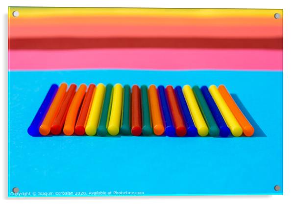 Colorful background of plastic bars, silicone glue, on a background of colored lines. Acrylic by Joaquin Corbalan