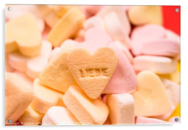 Word love written in German on a candy heart, sweet image for Va Acrylic by Joaquin Corbalan