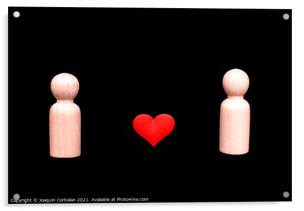 Wooden figures representing a homosexual couple of two gay men in love, with a beautiful red heart, isolated on a black background. Acrylic by Joaquin Corbalan