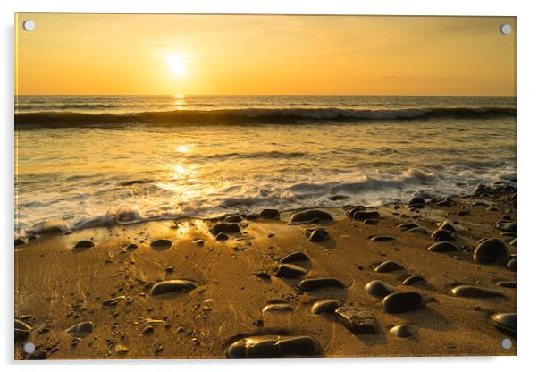 Sunlit pebbles on Westward Ho! beach at Sunset Acrylic by Tony Twyman