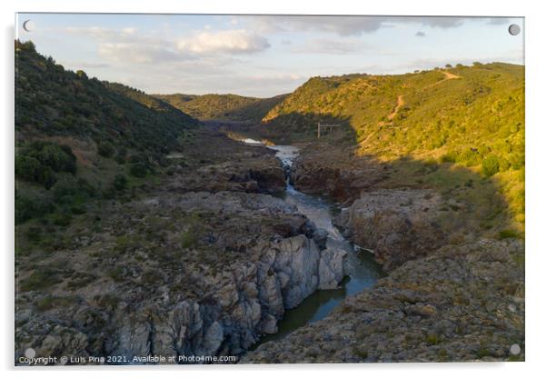 Pulo do Lobo waterfall drone aerial view with river guadiana and beautiful green valley landscape at sunset in Mertola Alentejo, Portugal Acrylic by Luis Pina