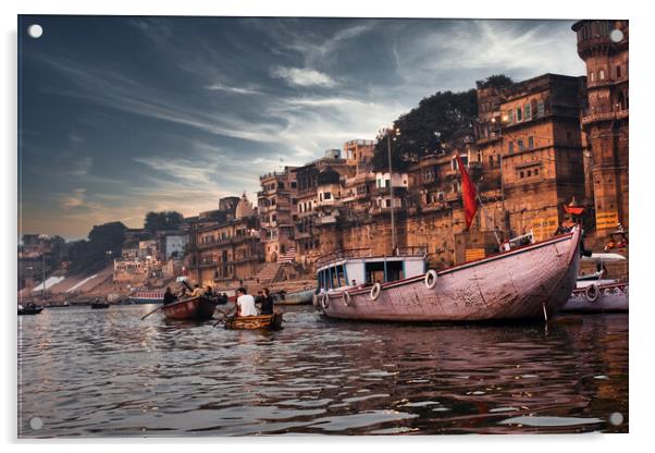 Varanasi, India: Dramatic sunset in a holy hindu place of worship with lots of tourists on boats and ancient architecture ghat located in Uttar pradesh. Acrylic by Arpan Bhatia