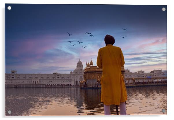 Amritsar, India: Unidentified Sikh Guard with spear standing and looking around near Sri Harmandir Sahib or Golden Temple pond against dramatic sunrise and birds in the sky Acrylic by Arpan Bhatia