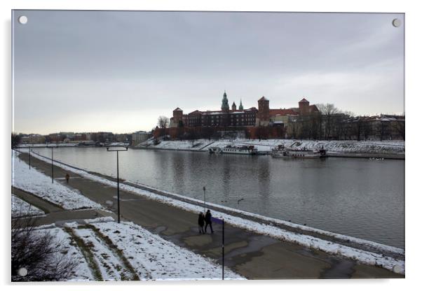 Krakow, Poland - January 29, 2015: Wide angle view of famous wawel castle covered with snow next to vistual river against cloudy sky Acrylic by Arpan Bhatia