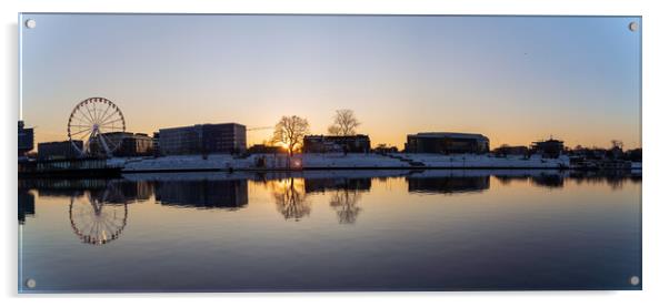 Krakow, Poland - January 31, 2021: Panoramic shot of Cracow cityscape, Ferris wheel and polish architecture next to Vistula river during sunset in Winter. Acrylic by Arpan Bhatia