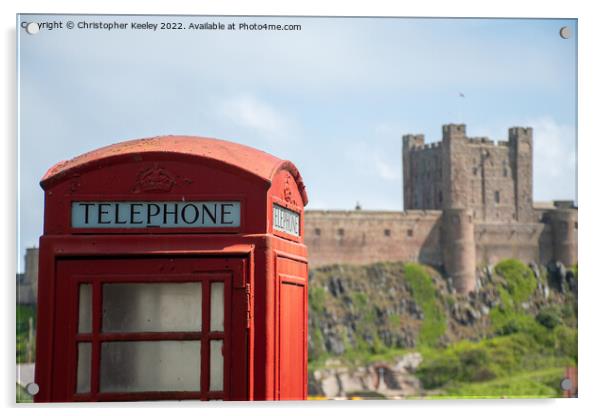 Bamburgh Castle red telephone box Acrylic by Christopher Keeley