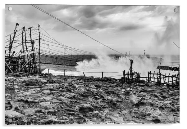 Big wave hits swinging rope foot bridge to island Acrylic by Hanif Setiawan