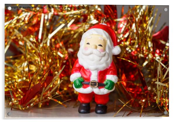 Santa Claus figurine and red and golden tinsel Acrylic by aurélie le moigne