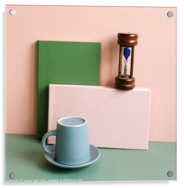 Notebook sandglass coffee cup on desk Acrylic by Sanga Park