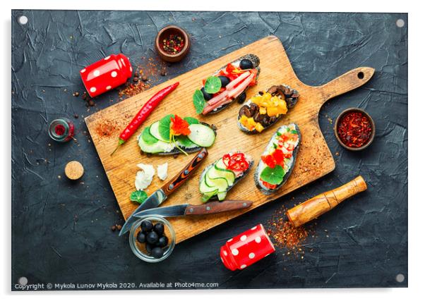 Set of bruschetta on cutting board Acrylic by Mykola Lunov Mykola