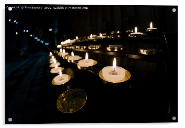 Prayer candles shine bright in a dark cathedral Acrylic by Rhys Leonard