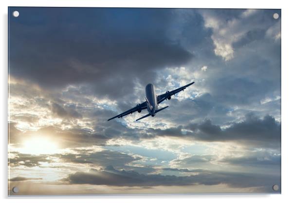 Passenger airplane on a cloudy sky Acrylic by Arpad Radoczy