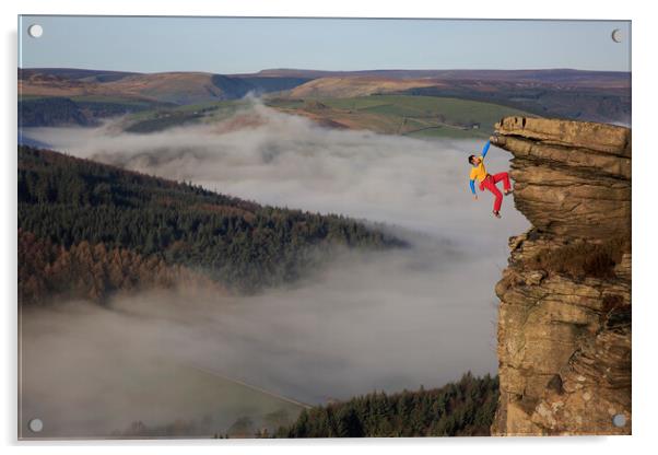 A rock climber free climbing on bamford edge in th Acrylic by MIKE HUTTON