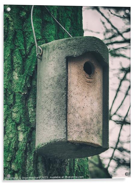 Vertical shot of a cylindrical concrete nesting box hanging from a tree Acrylic by Ingo Menhard