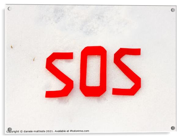 the word sos on a snowfield Acrylic by daniele mattioda