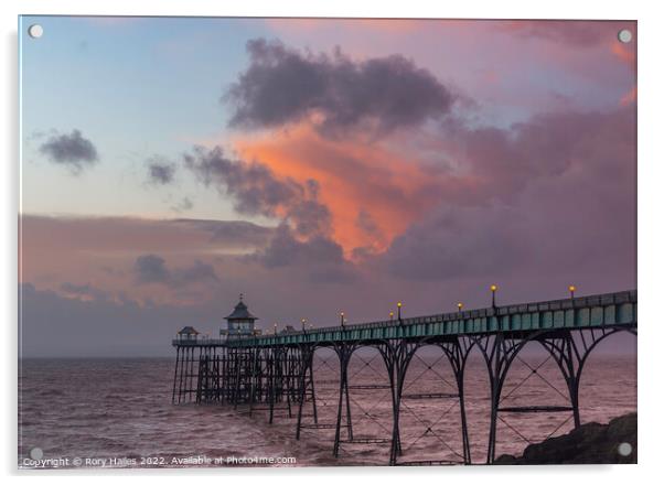 Clevedon Pier at sunset at low tide and choppy sea Acrylic by Rory Hailes