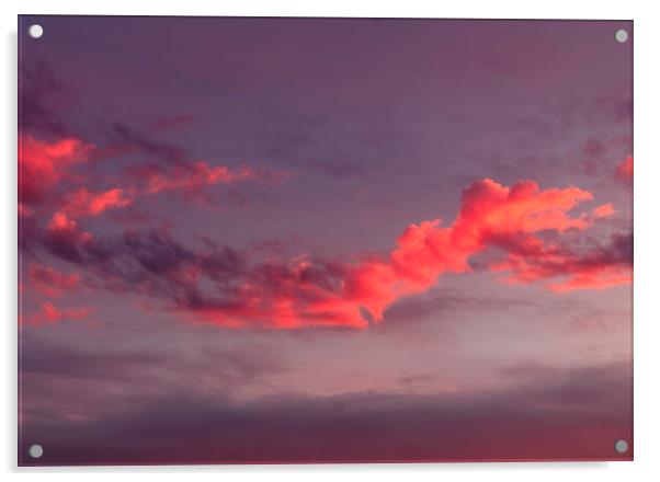 The setting sun lighting up a cloud Acrylic by Rory Hailes