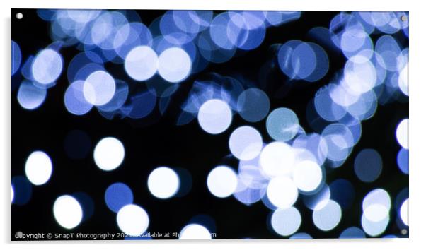 Abstract background of white and blue light halos or circles in a tree Acrylic by SnapT Photography