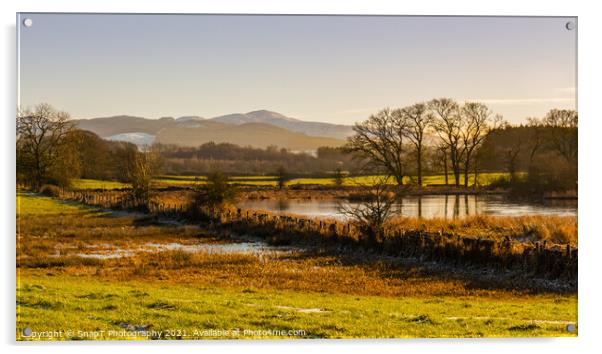 The River Dee in winter with a snow covered Bengairn Hill in the Acrylic by SnapT Photography
