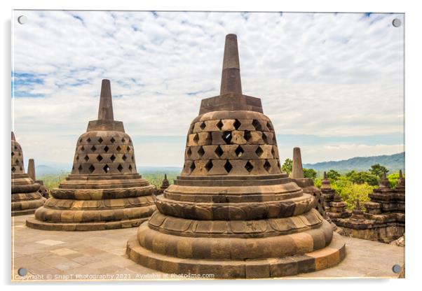 Stupas that look like bells on top of the Borobudur Buddhist temple, Indonesia Acrylic by SnapT Photography