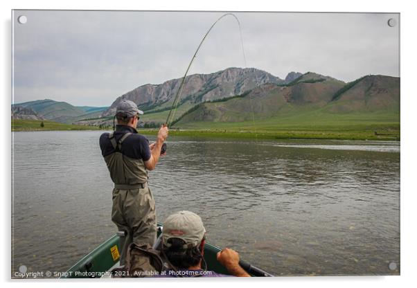 A fisherman with a Taimen Trout on the end of his line in Mongolia, Moron, Mongolia - July 14th 2014 Acrylic by SnapT Photography