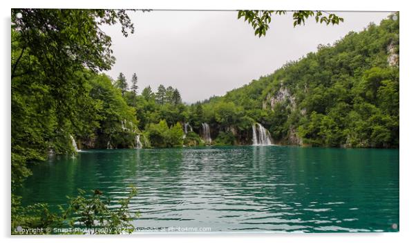 Water flowing over a series of waterfalls into a lake at Plitvice Lakes, Croatia Acrylic by SnapT Photography