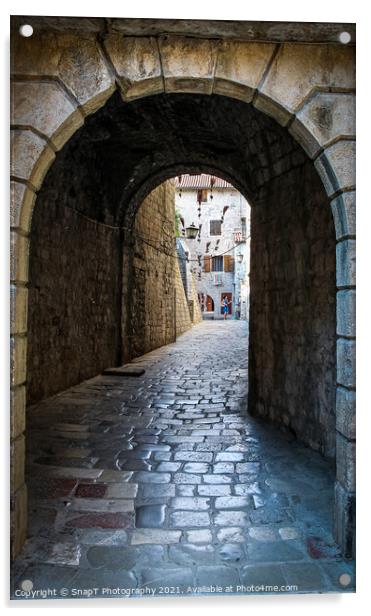 An alley way in the old town of Kotor, with flying brooms in the background Acrylic by SnapT Photography
