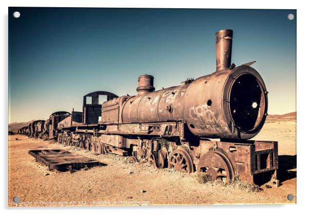 Old rusty train cemetery in Uyuni, Bolivia Acrylic by Delphimages Art