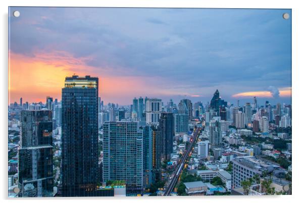 The Cityscape, the Railway of the Skytrain and the skyscraper of Bangkok in Thailand Southeast Asia at the Evening Acrylic by Wilfried Strang