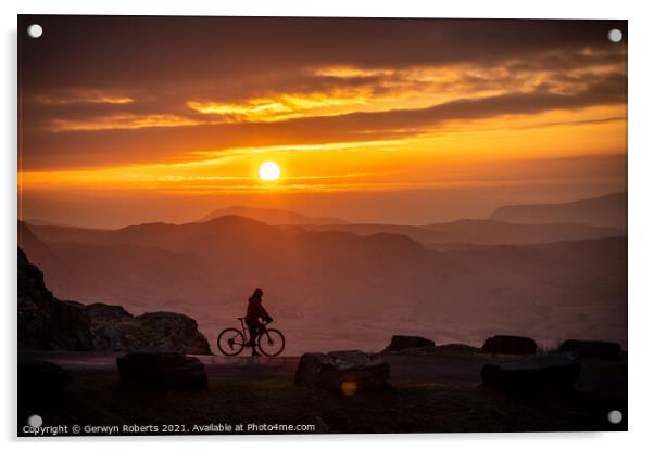 Cyclist's silhouette durning Sunrise Acrylic by Gerwyn Roberts