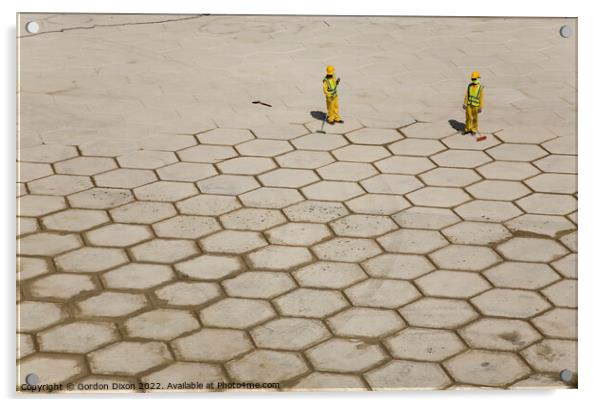 Pushing hexagons ? - workers in Dubai grout large tiles in Dubai Acrylic by Gordon Dixon