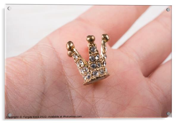 Little model crown is placed in hand Acrylic by Turgay Koca
