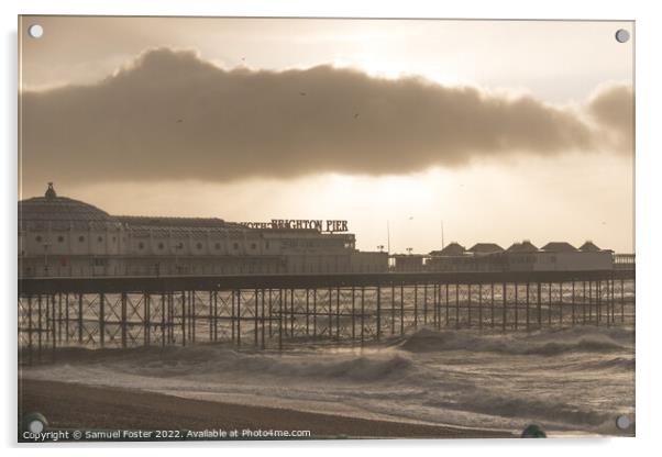 Brighton Pier on a stormy windy day with sun coming through clouds Acrylic by Samuel Foster