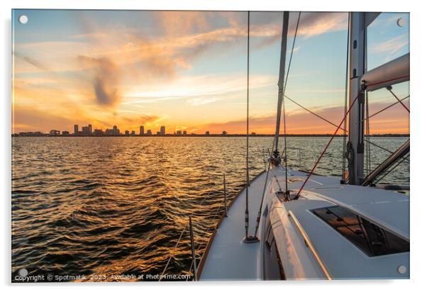 Yacht sailing towards cityscape on horizon at sunset Acrylic by Spotmatik 