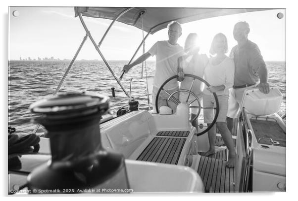 Senior friends enjoying retirement steering yacht at sunset Acrylic by Spotmatik 
