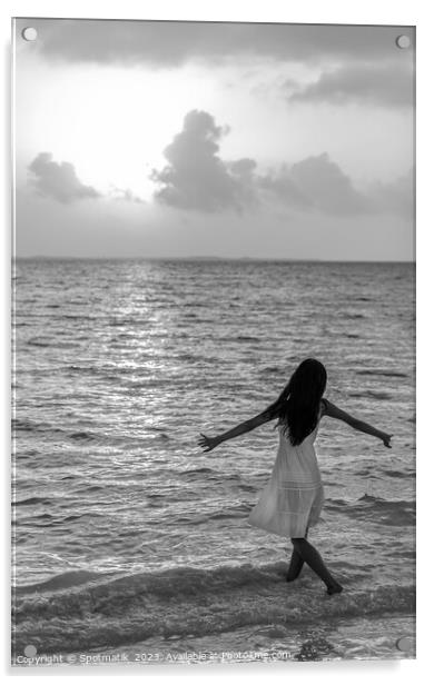 Asian female dancing in ocean waves at sunrise Acrylic by Spotmatik 