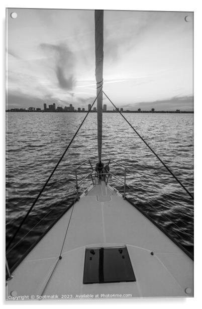 Bow of yacht sailing towards cityscape at sunrise Acrylic by Spotmatik 