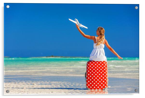 Girl sitting on red travel luggage on beach plane Acrylic by Spotmatik 